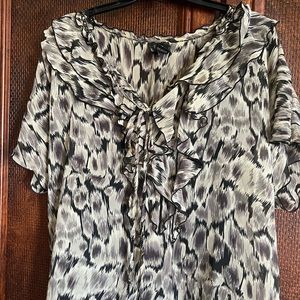 Beautiful black and ash color shirt.has gold embellishment around neck